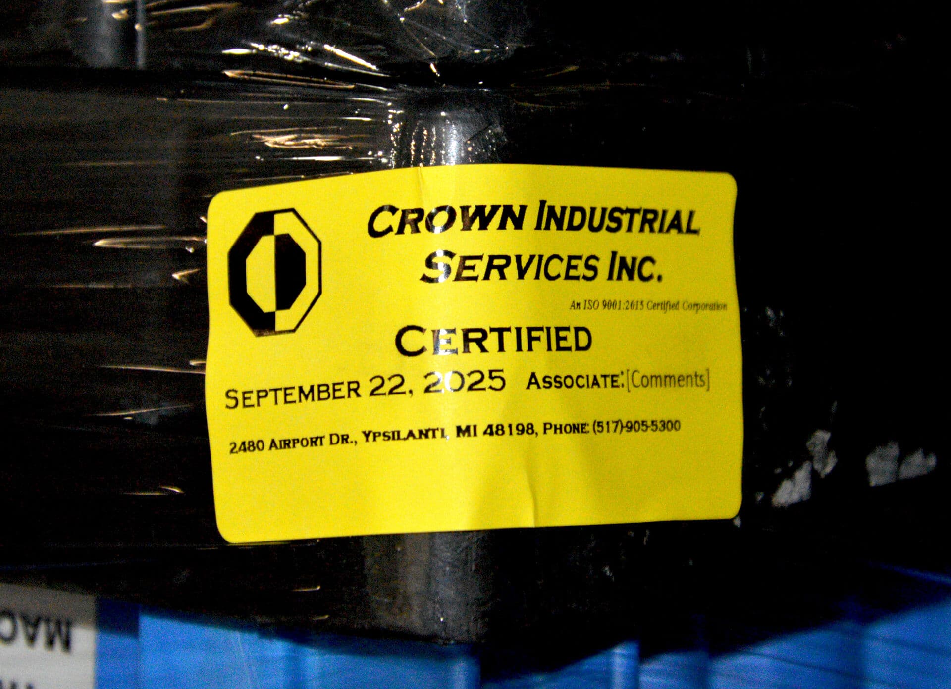Packaging with Crown Industrial Services label