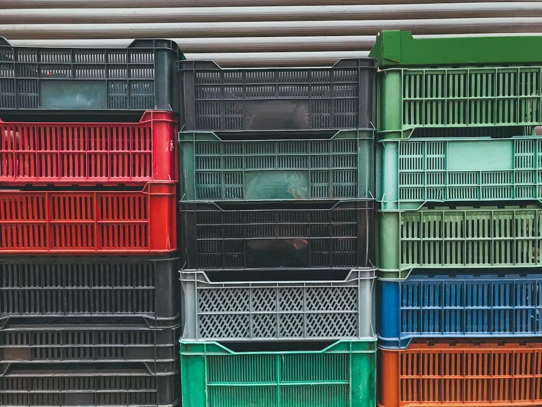 Stacks of colorful reusable plastic dunnage